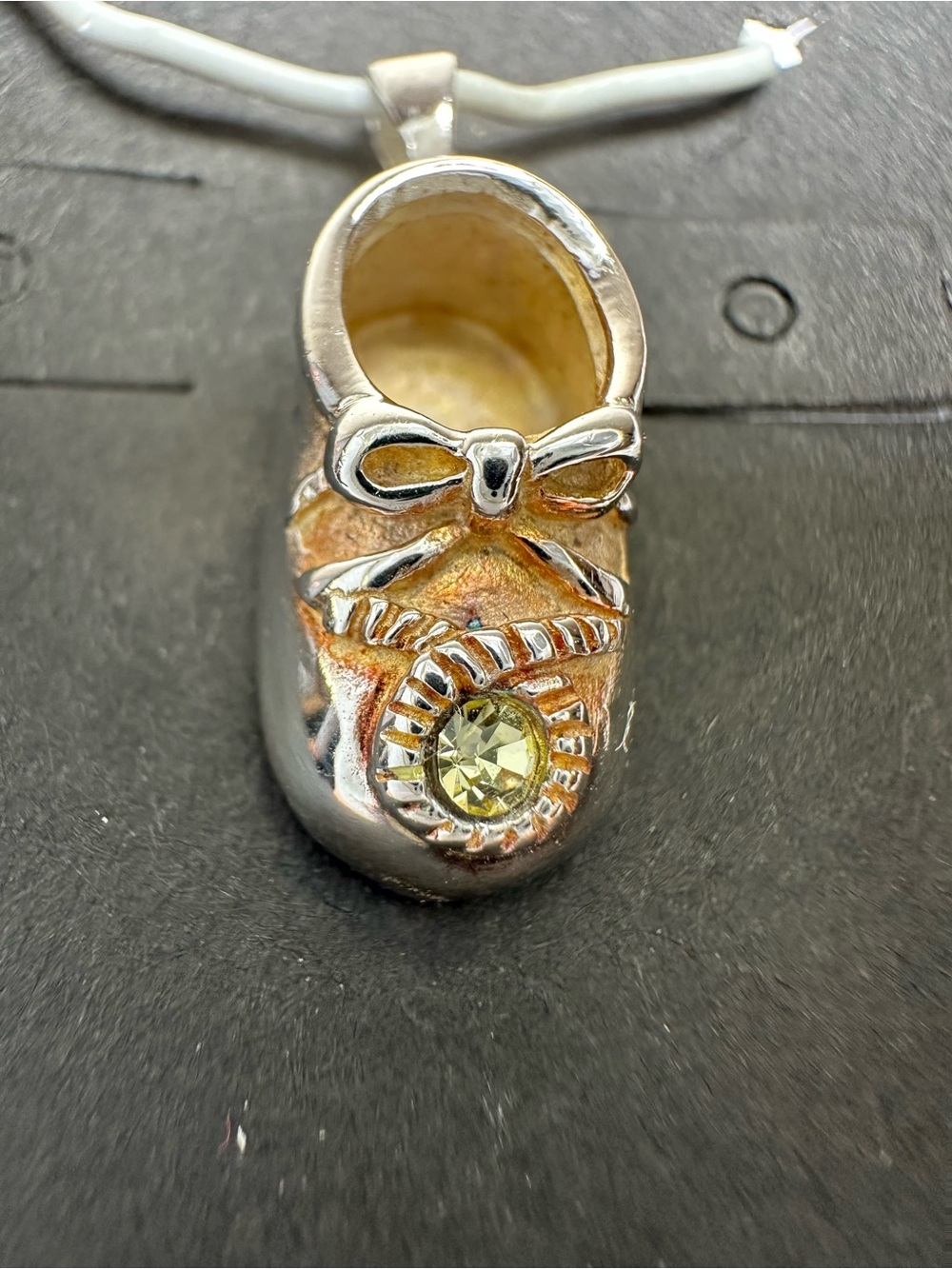 Silver Baby Girl Shoe Pendant with greenCrystal.